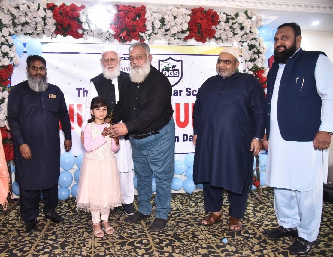 A student receives recognition at a school event